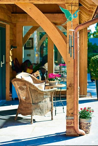 Oakwrights timber frame home veranda seating