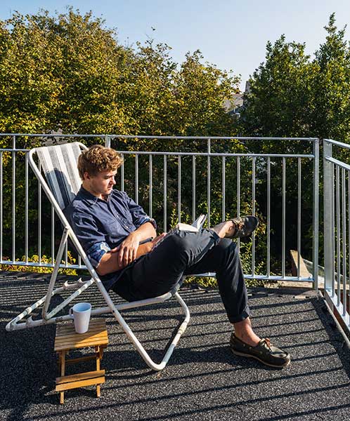 Adam Humphrey on roof terrace of 1940s eco renovation