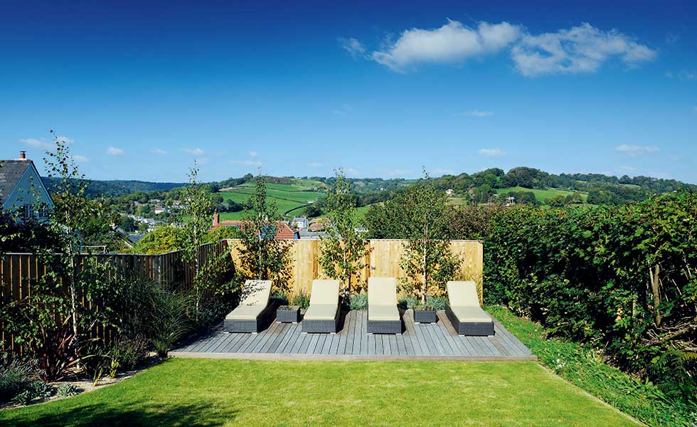 garden of a sloping site bungalow