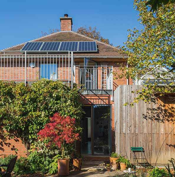 rear view of 1940s renovation with roof terrace