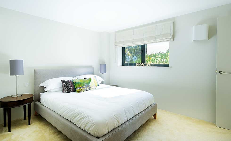 white bedroom in extended bungalow