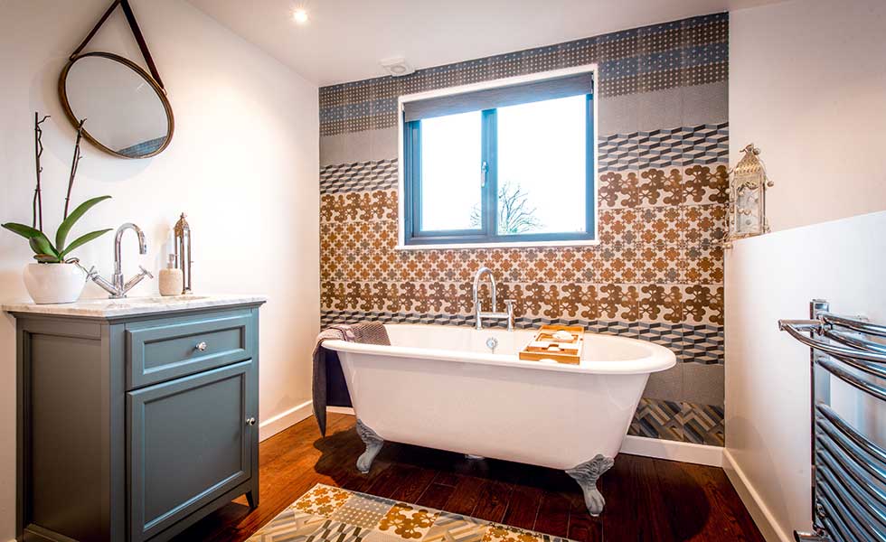 bathroom in loft conversion with spanish tiles