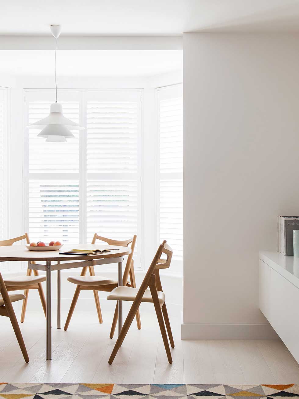 london flat dining area with floating storage
