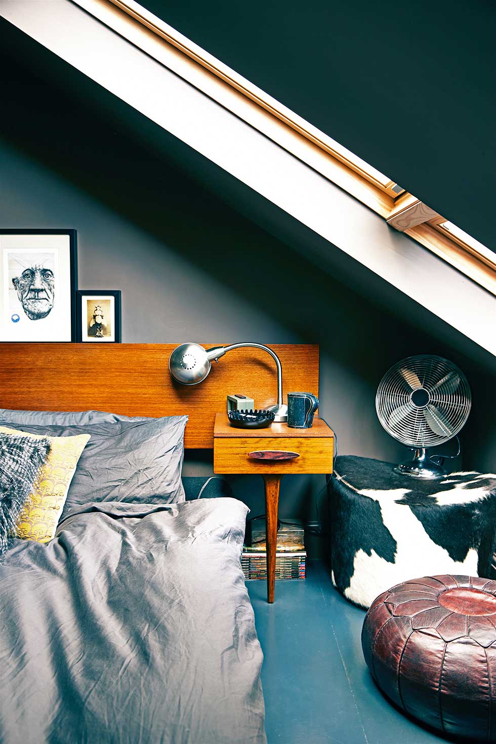 Duplex apartment mid-century bed in dark bedroom