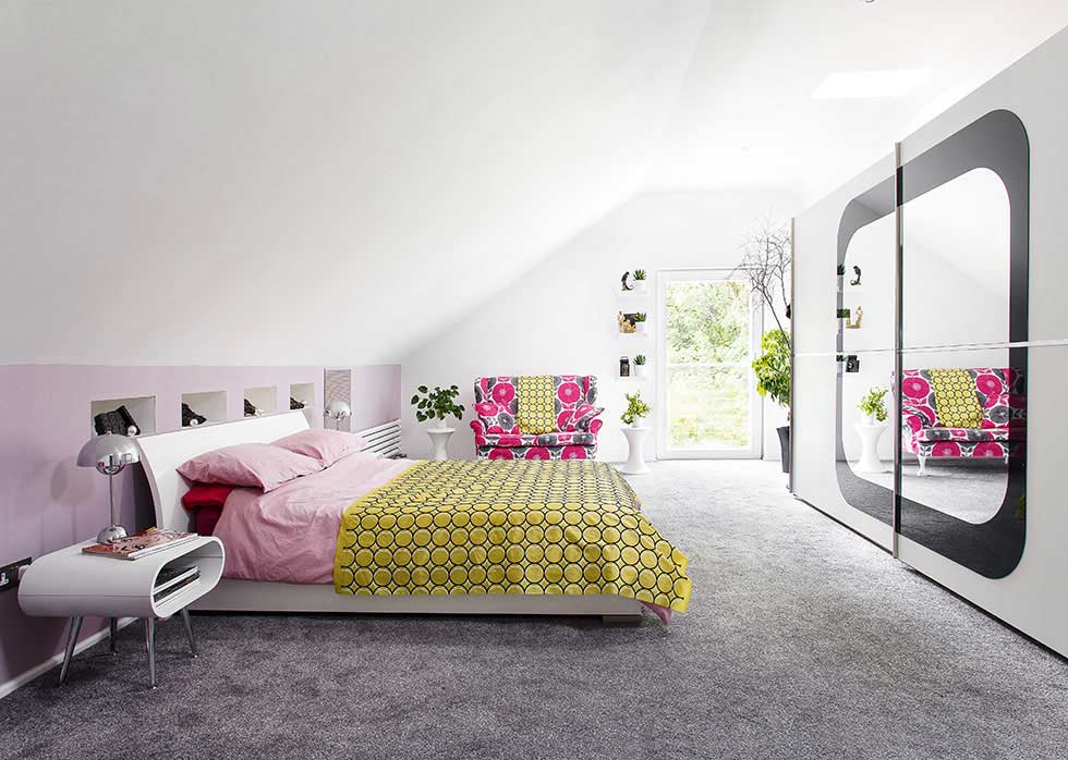 colourful master suite in a stone barn conversion