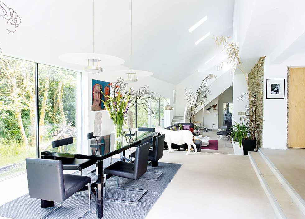 Open plan kitchen-diner and living area in a stone barn conversion