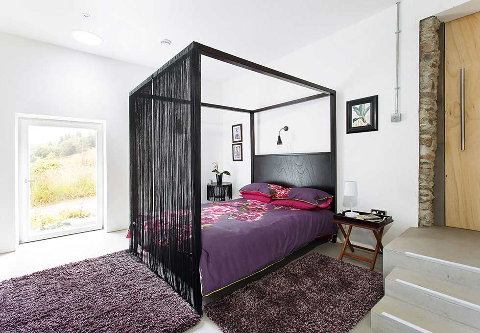 guest bedroom in a stone barn conversion
