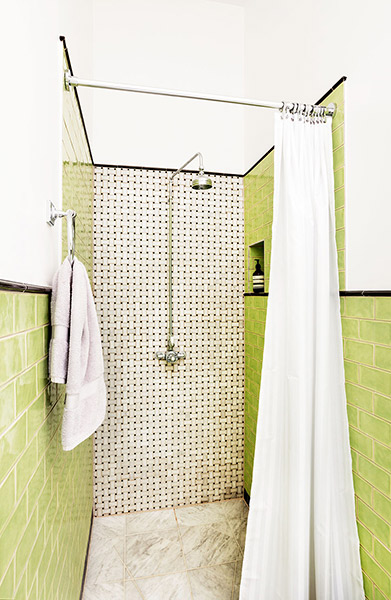 green tiled Victorian bathroom in a victorian renovated flat