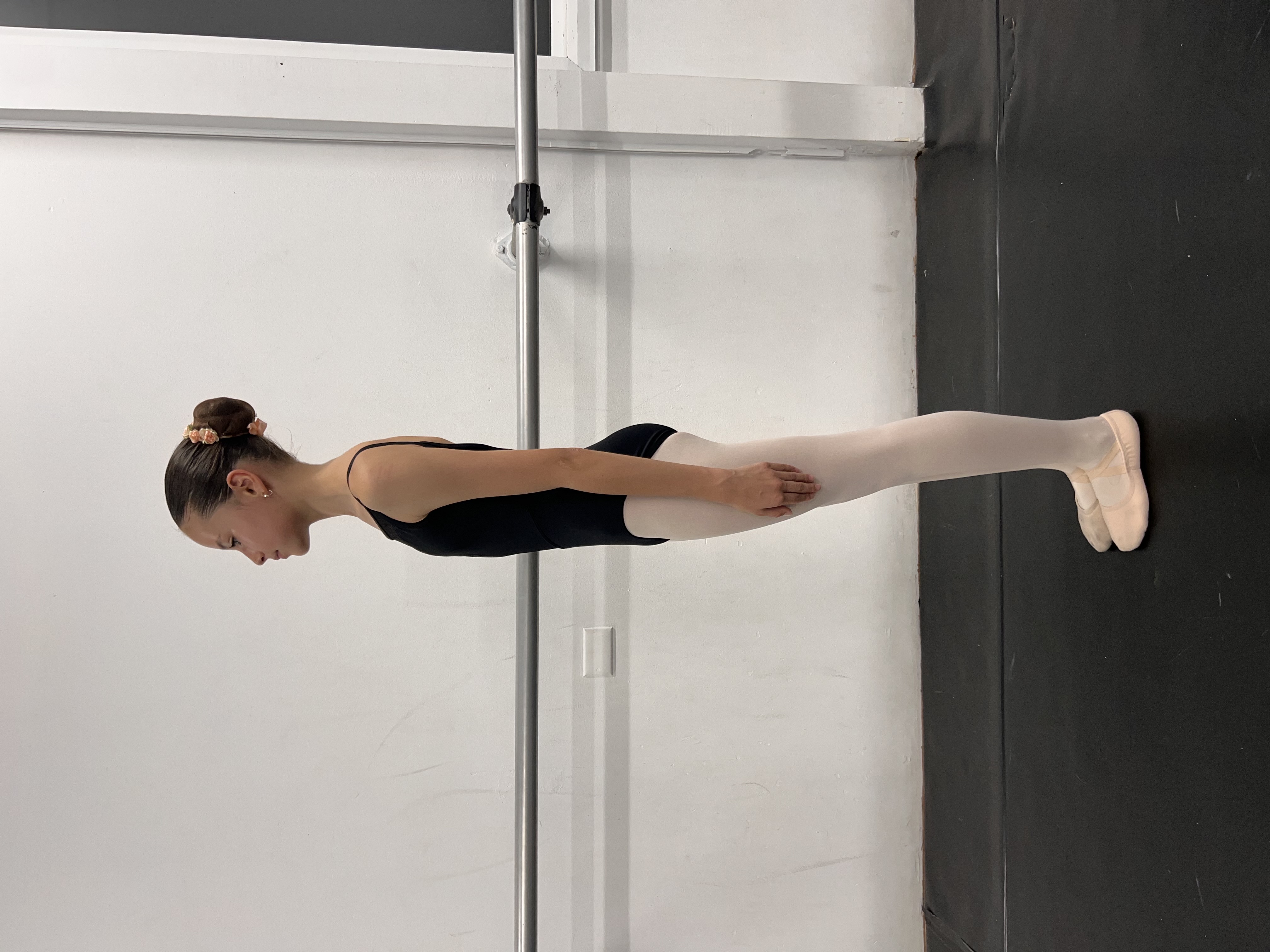 Jasmine Hooper full length, facing side on profile.JPG