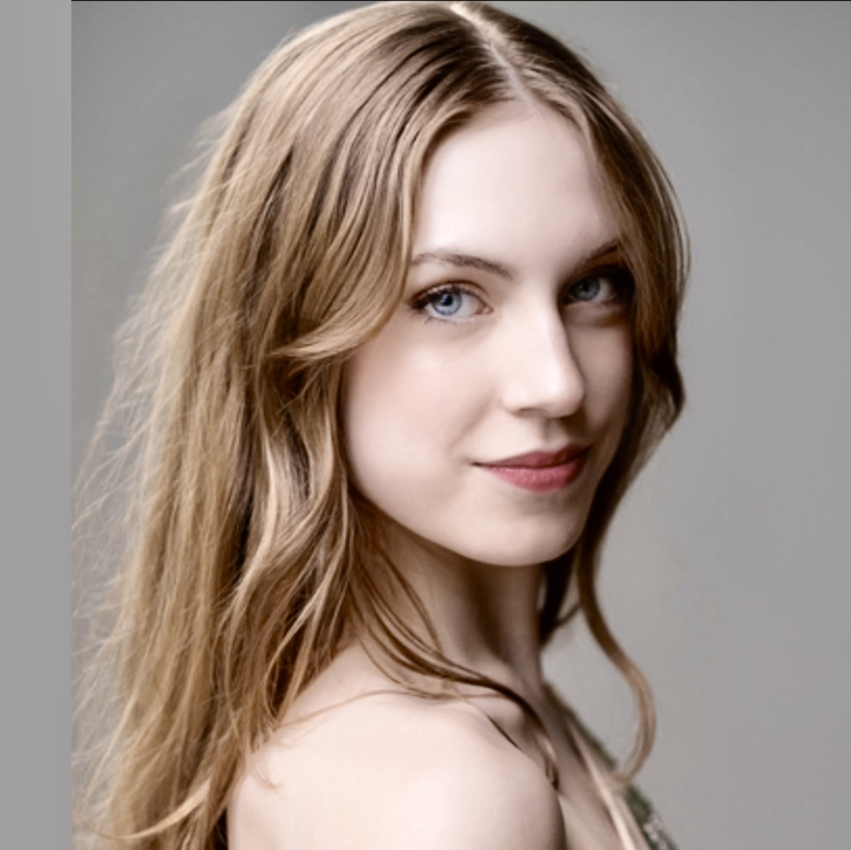 Lucy Hassmann headshot 2023 (2).jpeg