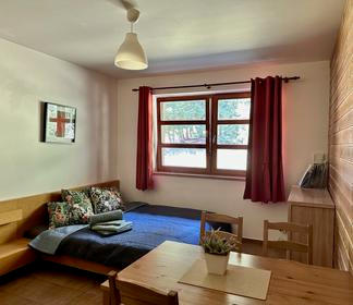 Obývací pokoj apartmánu 208.