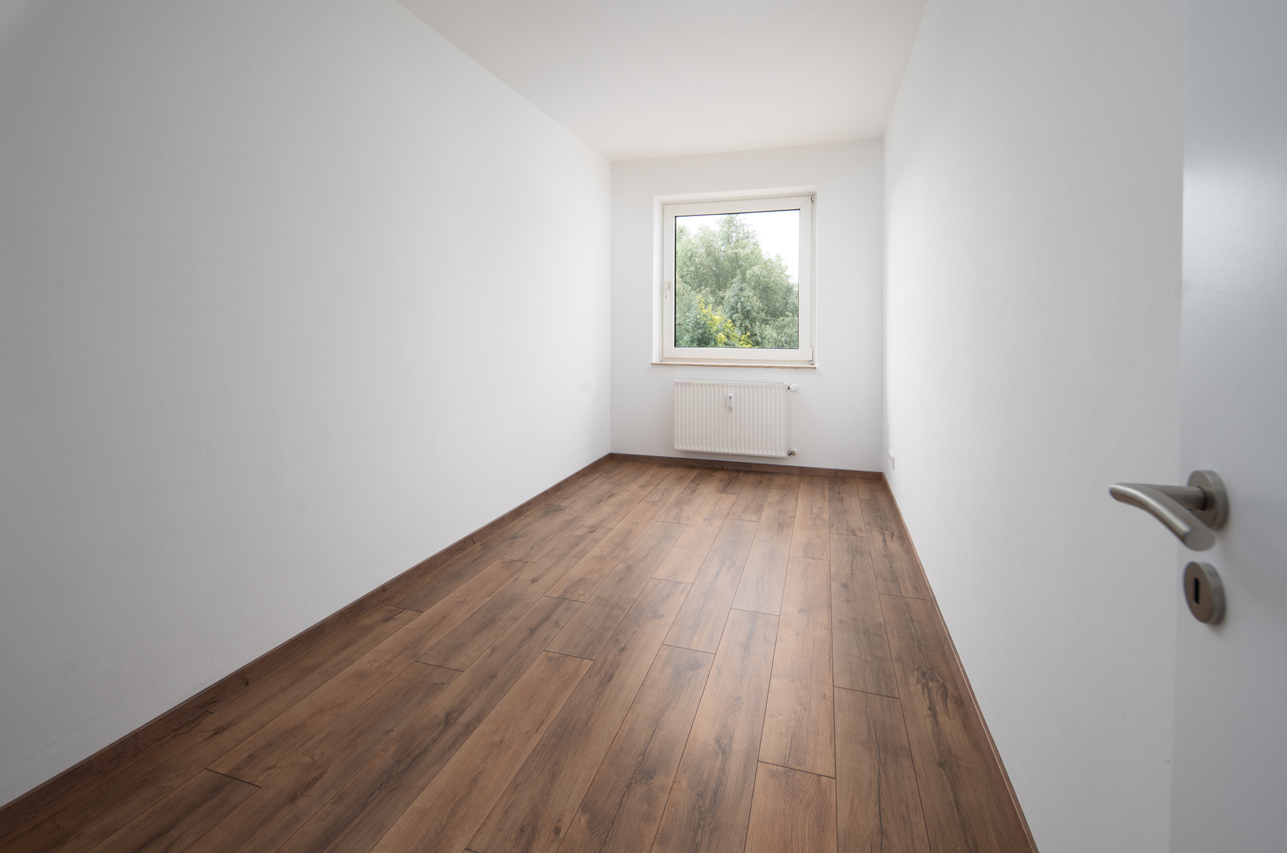 11-Parteienhaus mit 6 Garagen in Bremen Burgdamm — Schlafzimmer WE EG