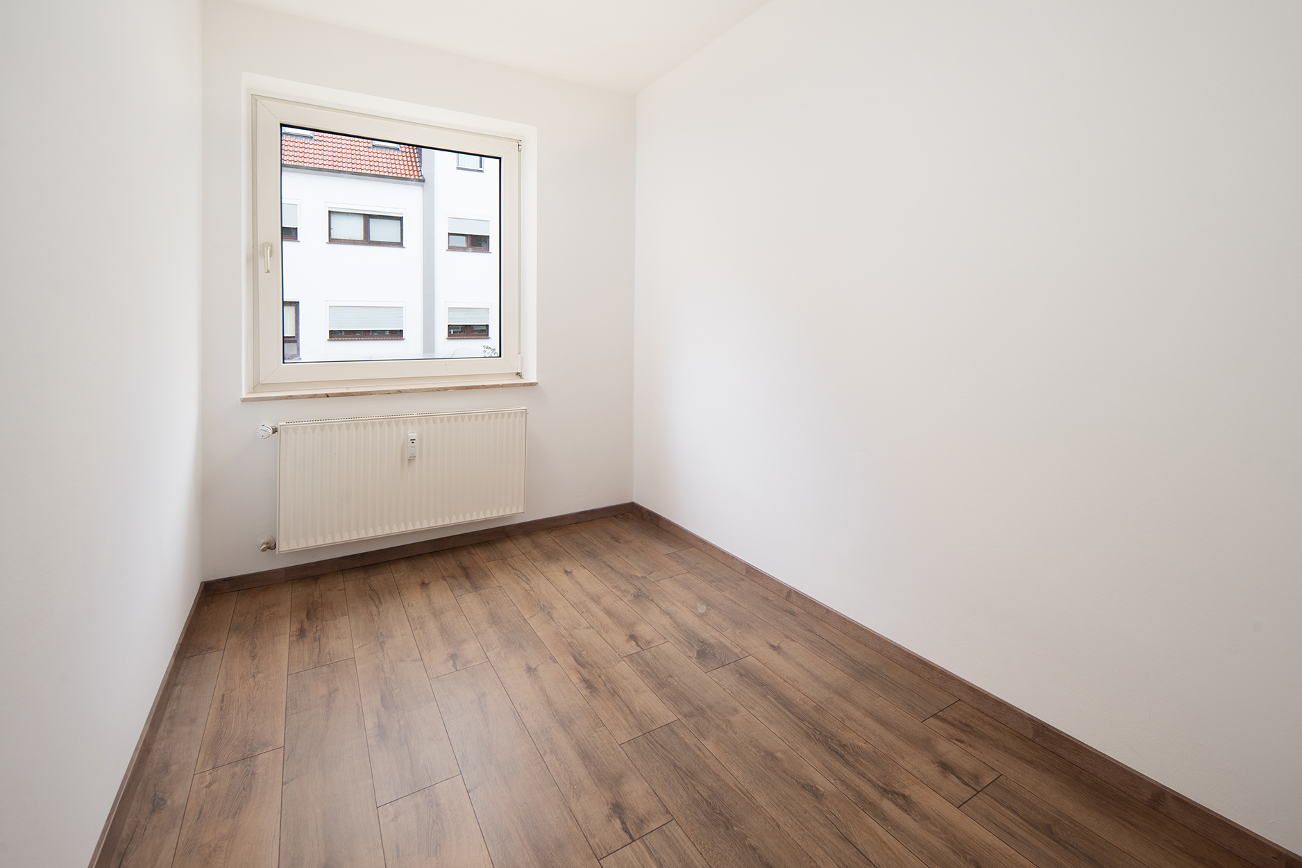 11-Parteienhaus mit 6 Garagen in Bremen Burgdamm — Schlafzimmer WE EG