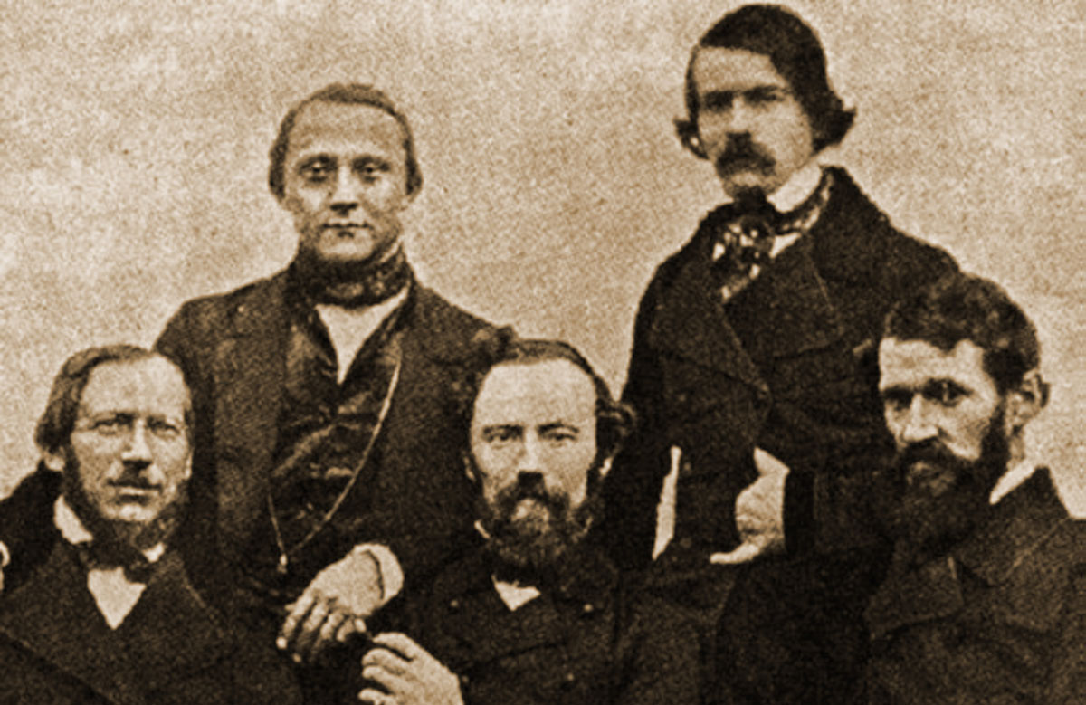 Historische Fotografie einer Gruppe von fünf Ärzten in Sepiatönen.