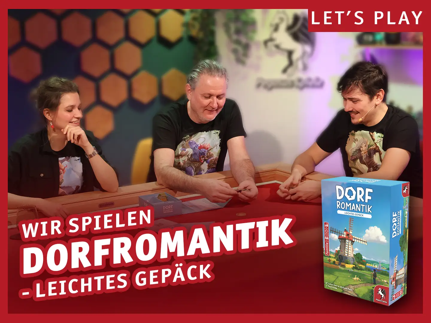 Wir spielen Dorfromantik - Leichtes Gepäck; Drei Personen sitzen an einem Tisch und spielen das Brettspiel Dorfromantik - Leichtes Gepäck