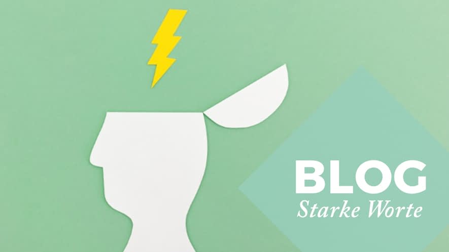 Weißer Kopf im Profil aus Papier mit Blitz