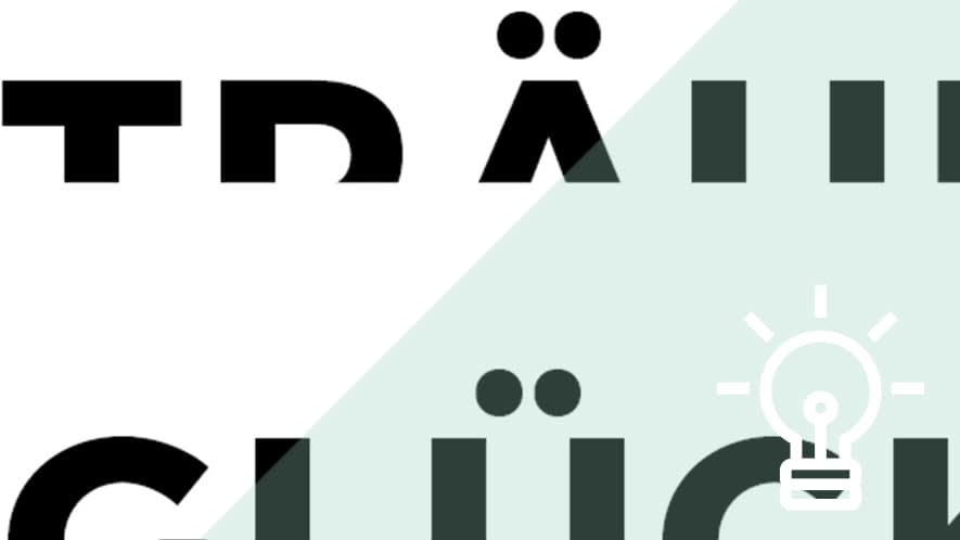 Halbe Buchstaben mit Glühbirne