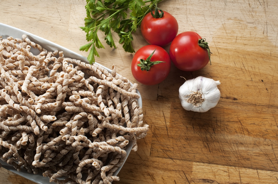 raw pasta called busiate with whole wheat flour of buckwheat