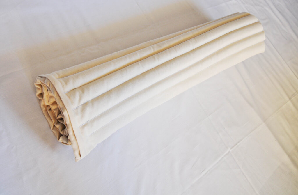 rolled up mustard seeds mattress by EcoHealthLAB