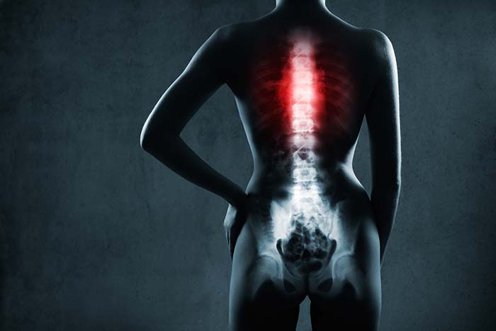 human spine and a hard buckwheat mattress