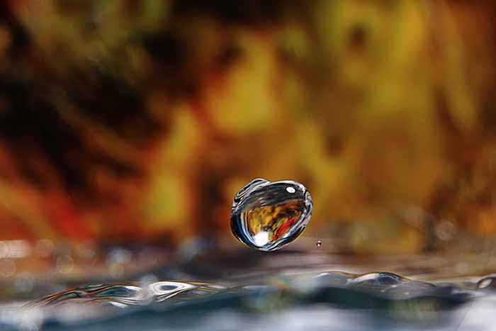 falling drop of water drills the rock