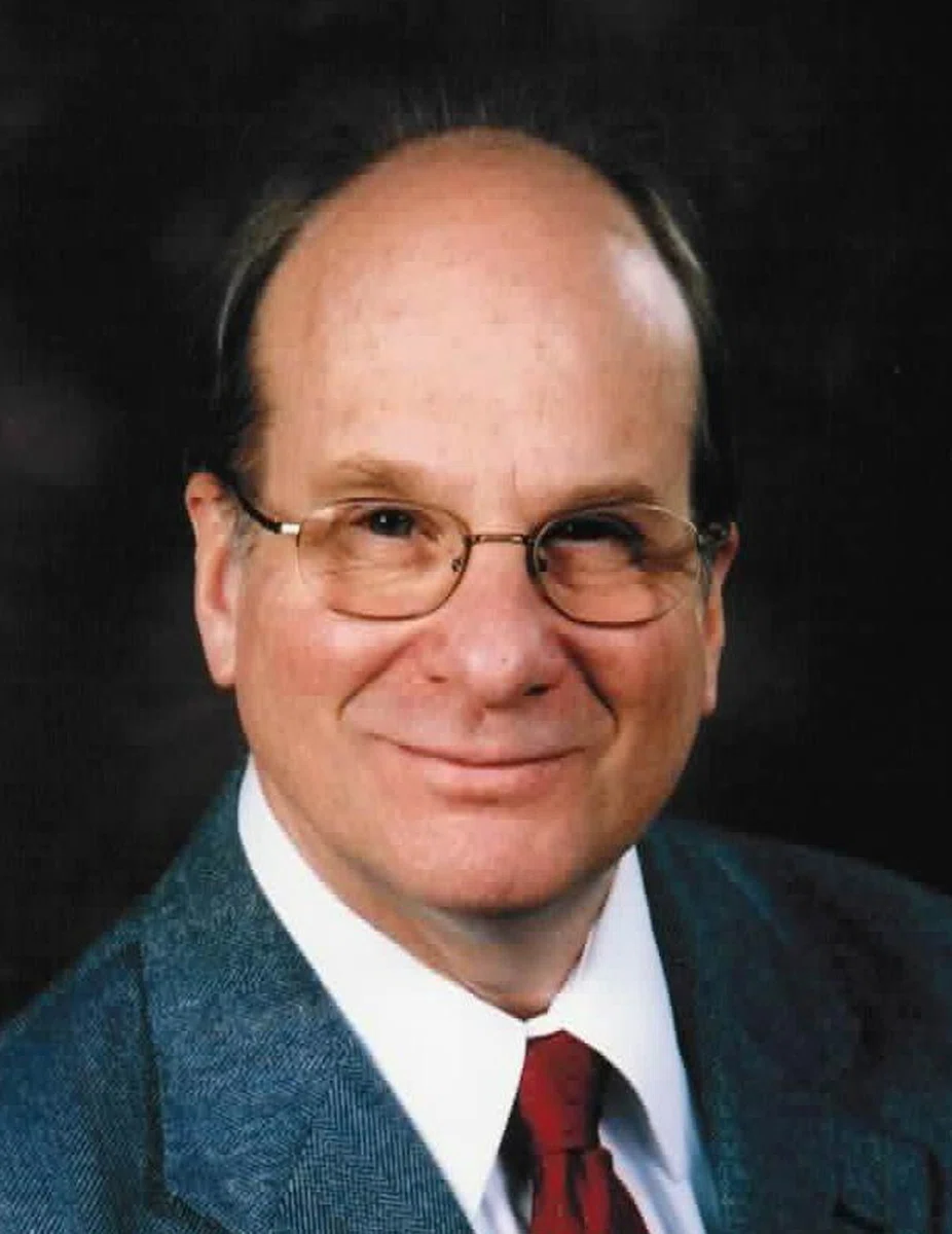 Portrait of Louis E. Brus (1943–2026) – memorial page