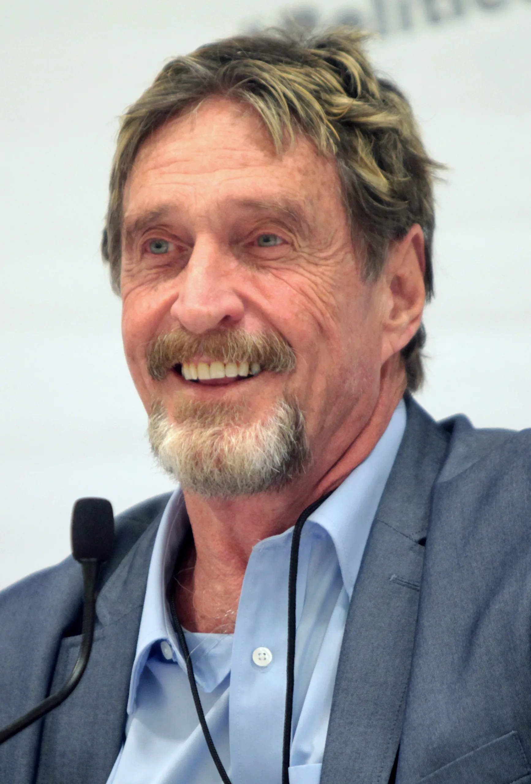 Portrait of John McAfee (1945–2021) – memorial page