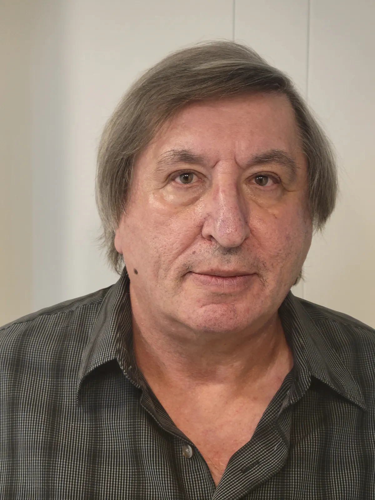 Porträt von Eugene Plotkin (1955–2026) – Gedenkseite