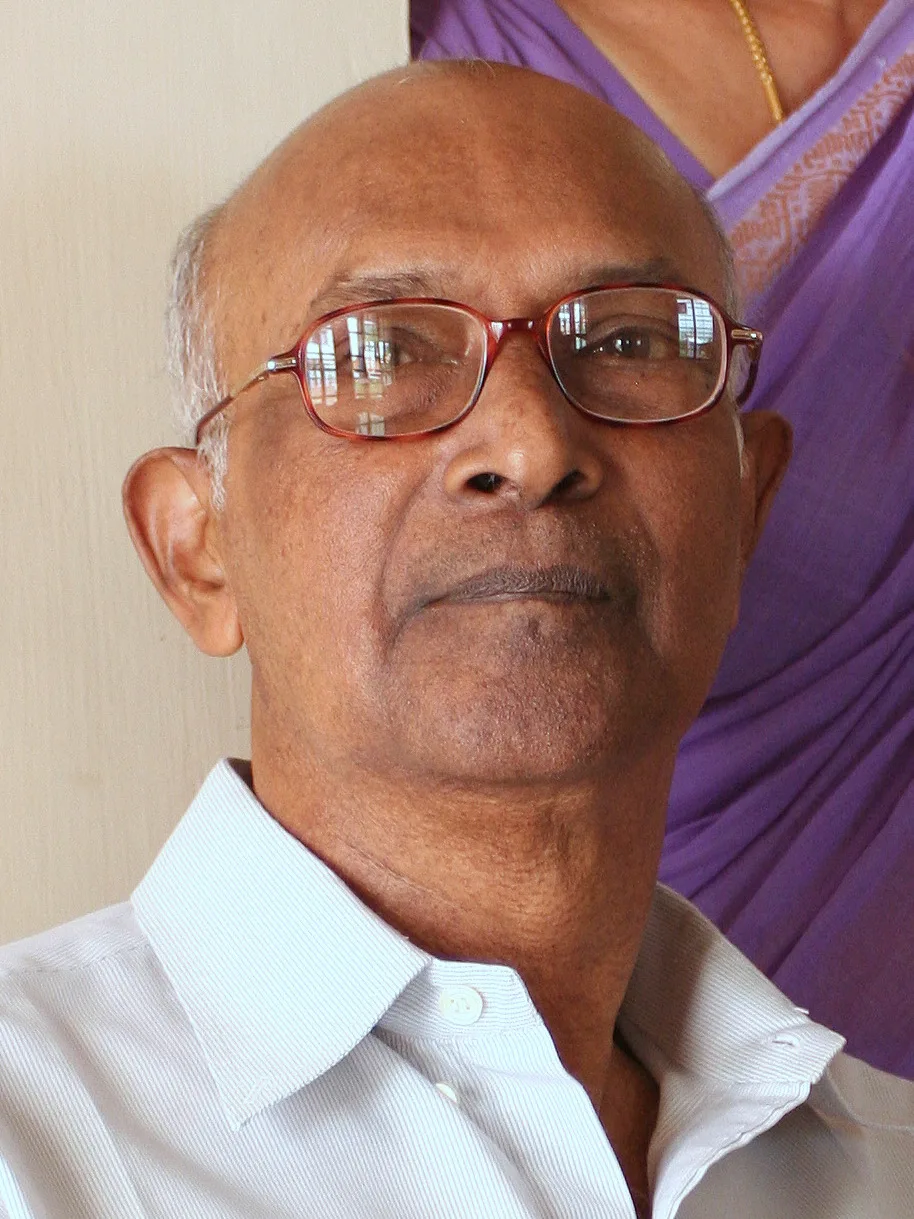 Porträt von Kattungal Subramaniam Manilal (1938–2025) – Gedenkseite