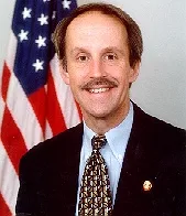 Portrait of Frank Riggs (1950–2023) – memorial page