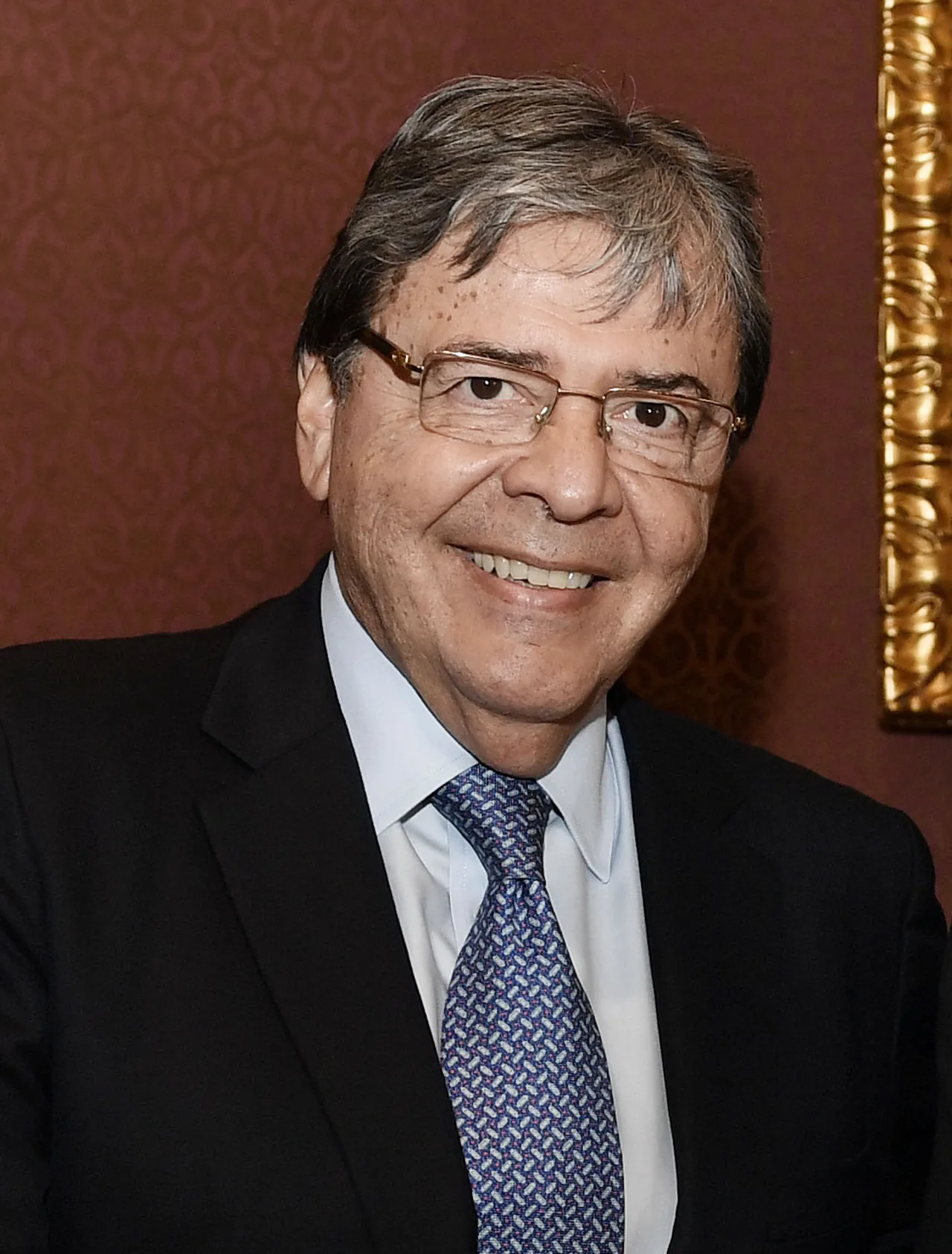 Portrait of Carlos Holmes Trujillo (1951–2021) – memorial page