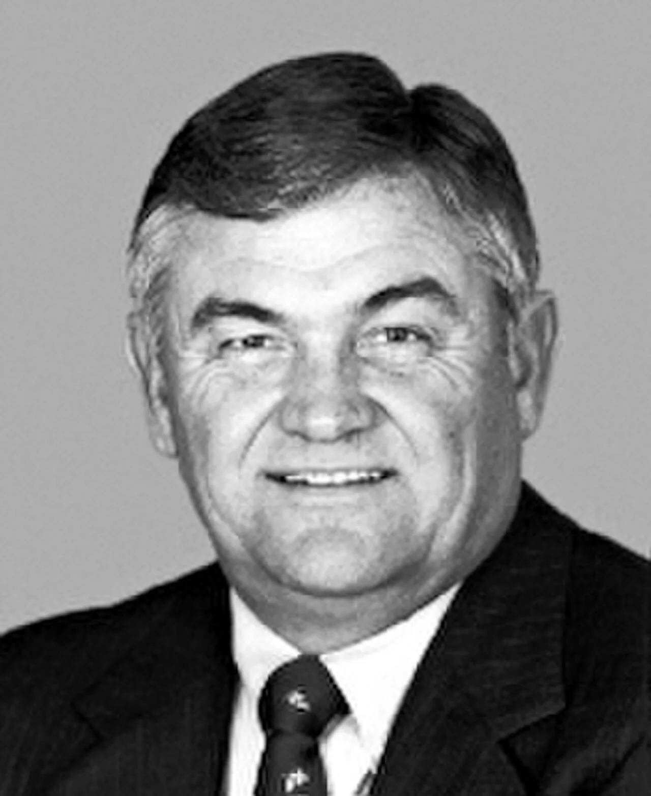 Portrait of William K. Brewster (1941–2022) – memorial page