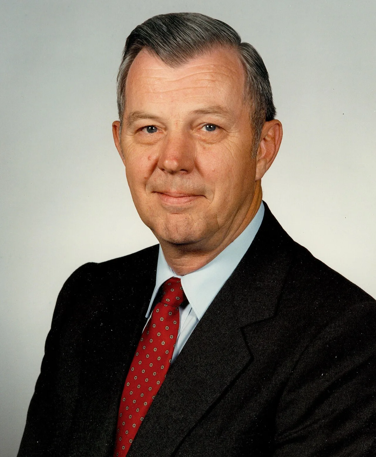 James B. Busey IV.