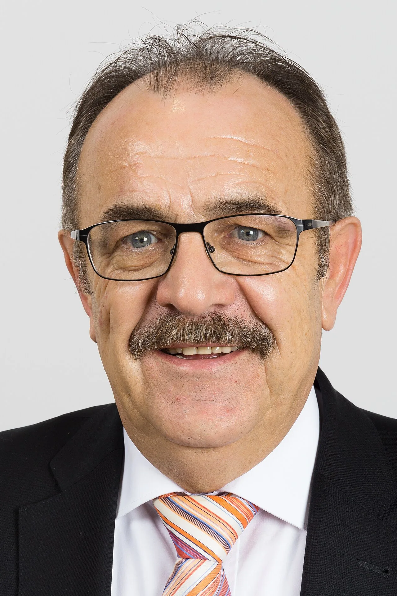 Porträt von Arnold Schmitt (1954–2023) – Gedenkseite