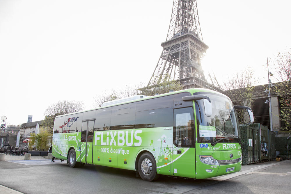 FlixBus E-Bus in front of Eiffel Tower FlixBus E-Bus in front of Eiffel Tower