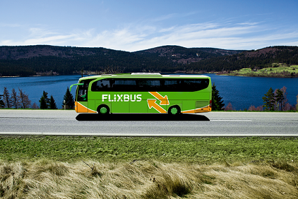 Read more about FlixBus Picture of a FlixBus driving at the bottom of the alps