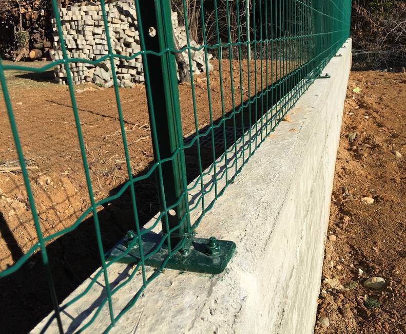 Galvanized sleeve anchored T-post For a wall installation