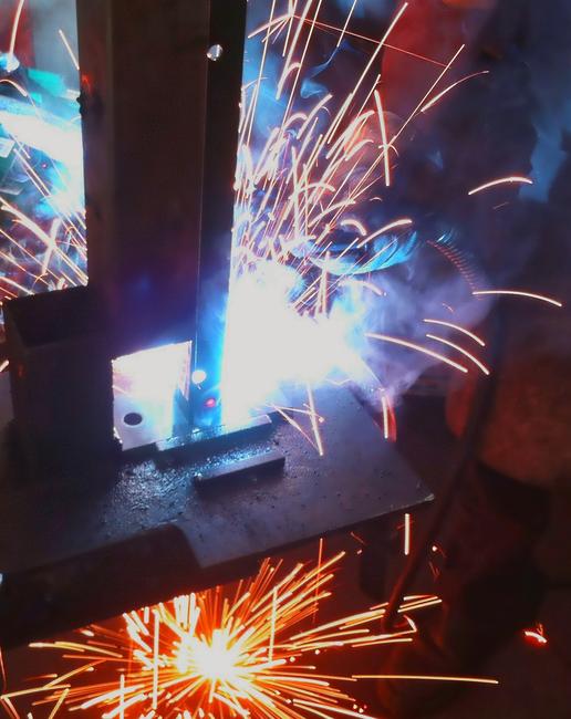 Galvanized T-post with welded fixing plate For a wall installation