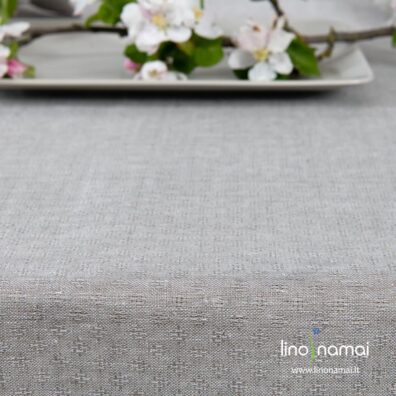 Lininės staltiesės audinys austas iš baltų ir naturalios spalvos verpalų ažūriniu raštu