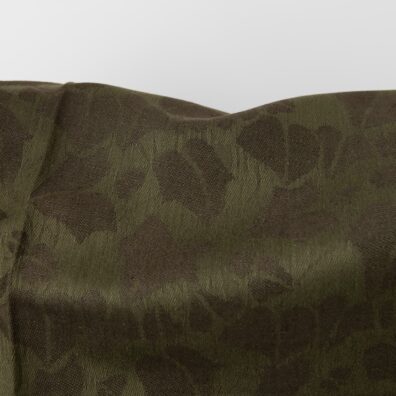 Žalias žakardinis lino - medvilnės audinys lapelių raštu tinka drabužiams ir namų tekstilei siūti