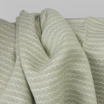 Žalsvas lino - medvilnės audinys bangelių raštu