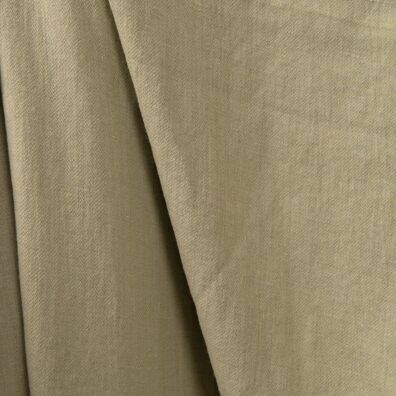 Žalsvai pilkas dvipusis lino-medvilnės audinys, skalbtas, tinka drabužiams ir namų tekstilei siūti