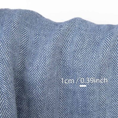 Mėlynai baltas lininis audinys „eglutės“ raštu skalbtas minkštas švelnus