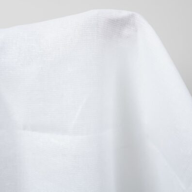 Ryškiai baltas lino audinys „vafliniais“ langeliais