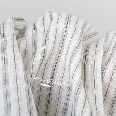 Pieno baltumo lino audinys pilkais dryžiais drabužiams ir namų tekstilės gaminiams