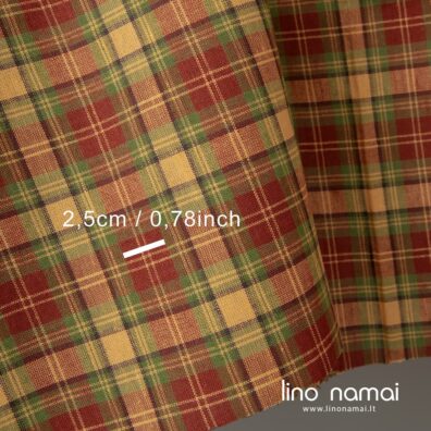 Lino - medvilnės audinys languotas, išaustas iš gelsvų, tamsiai rudų, žalių, blyškiai raudonų verpalų