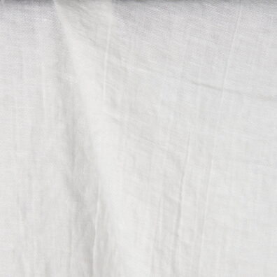Pieno baltumo skalbtas lininis audinys.