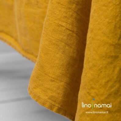 Geltona skalbto lino staltiesė paprastai palenkta