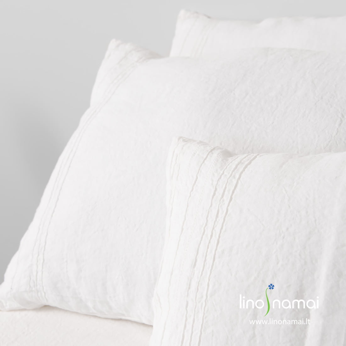Lininis baltas mereškuotas pagalvės užvalkalas