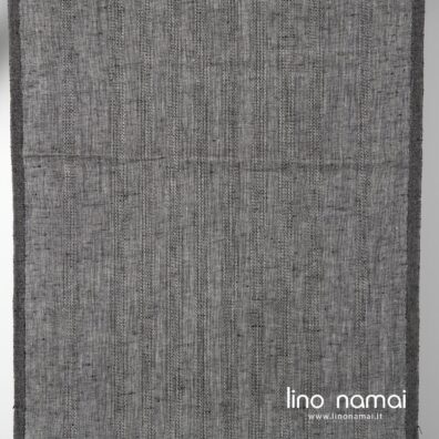 Lininis pilkai juodas audinys ažūrinėmis juostelėmis